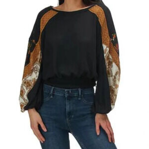 Free People long sleeve raglan top with banded bottom size small in black